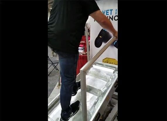 The author trying the Arctic Grip sole at a trade show in August 2017.