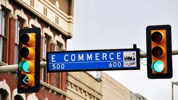 Photo of a street sign called "E Commerce."