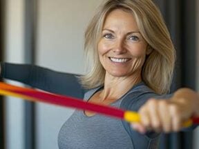 Female exercising with resistance bands
