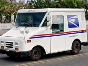 Photo of a USPS postal delivery vehicle