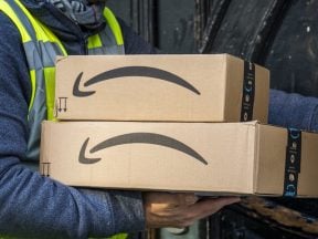 Photo of Amazon-labeled boxes being delivered