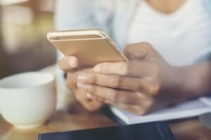 Female hands holding a smartphone