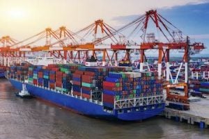 Photo of a huge container ship at a port