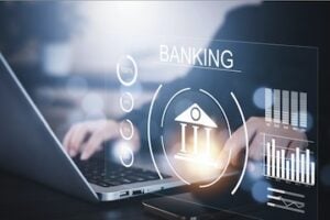 Illustration of a laptop computer next to charts and graphs