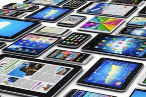 Image of dozens of tablets and smartphones