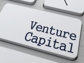 "Venture" placed on the return key of a keyboard