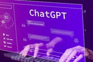 Illustration with the words "ChatGPT" on a keyword with hands typing