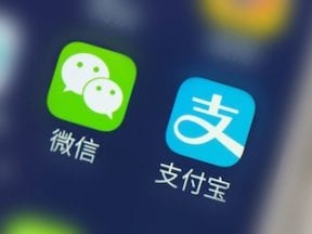 Mobile phone screen with WeChat and Alipay apps
