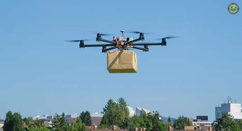 Photo from FAA page's on Medium of a drone carrying a package Photo from FAA page's on Medium of a drone carrying a package