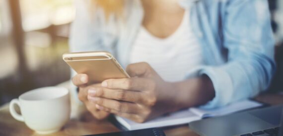 Female hands holding a smartphone Female hands holding a smartphone