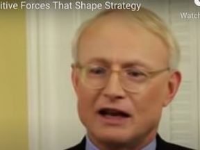 Screenshot from YouTube video showing Michael Porter speaking