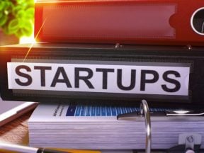 Image of a notebook reading "startup"