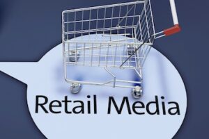 Illustration of the words "retail media" next to a physical shopping cart