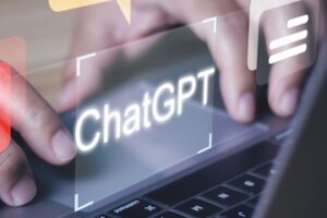 Illustration of the word "ChatGPT" on a laptop keyboard