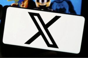 X logo on a smartphone screen