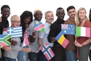 Image of people from different cultures holding flags