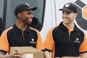 Image from UniUni of two male delivery drivers