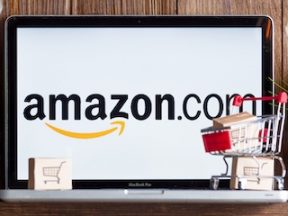 Image of a laptop with Amazon.com logo on the screen