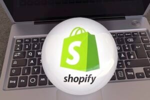 Illustration of a Shopify icon over a keyboard