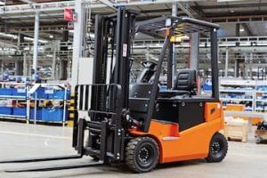 Photo of a forklift in a warehouse