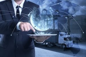 Illustration of a man holding a laptop with a globe superimposed