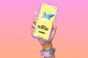 Image from Nuvei of a smartphone showing the Wero logo and promo