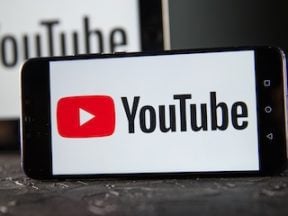 YouTube logo on a smartphone screen