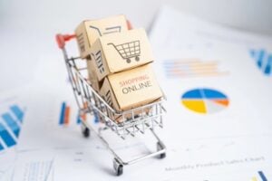 Shopping cart logo on box on graph. Banking Account, Investment economy, trading, Business import export transportation online.