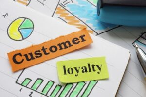 Illustration of the words "Customer Loyalty" on a bar graph