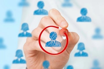 Illustration of a single isolated person among a group of many